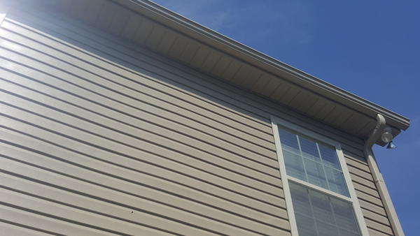 Buckling siding- back of house | Smithbilt Homes